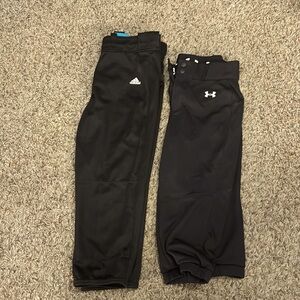 Women’s softball pants.  Under Armor and Adidas.  Both black, size small. EUC.